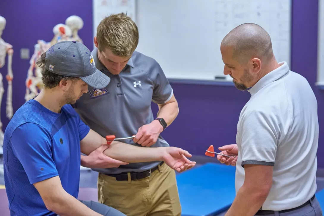 Exercise Science students testing reflexes